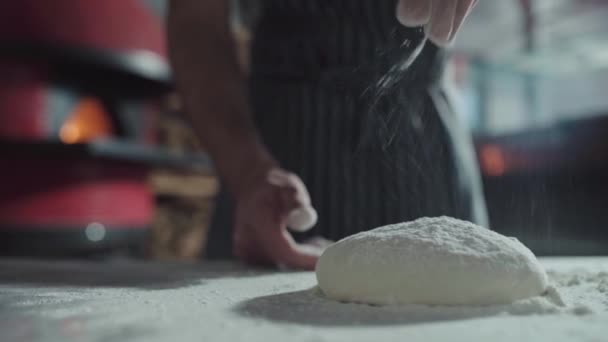 Male Baker Throwing Flour Preparing Dough Dolly Slow Motion — Stockvideo