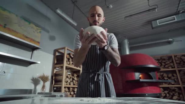 Slow Motion Baker Throws Dough Table Flour — Αρχείο Βίντεο