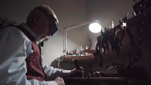Senior Man Jeweller Working His Workshop — Stock video