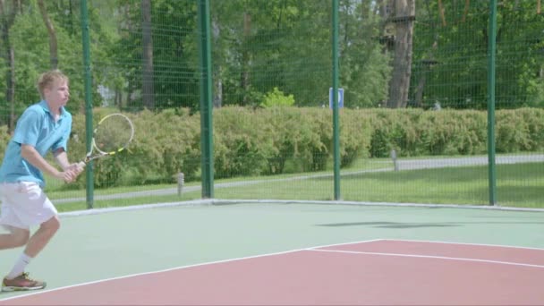 Dubbelfattad Backhand. Spektakulär tennis sköt i slow motion. — Stockvideo