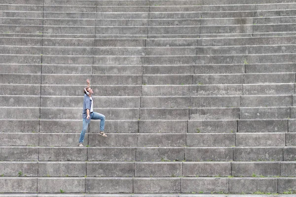 Happy Man Listening Music Dancing Alone Stairs Grandstand — Stock fotografie