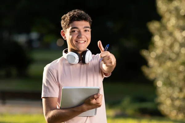 Portrait Success Hispanic Student Gesturing Thumbs Making Sign — Stok Foto