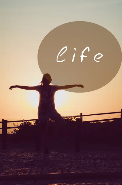 Silhouette of pretty woman photographer standing near ocean. Oval insert with life sign — Stock Photo, Image