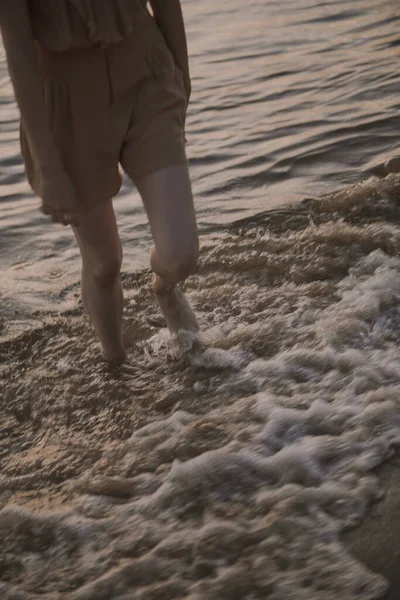 Beine Wasser Strand Stockbild