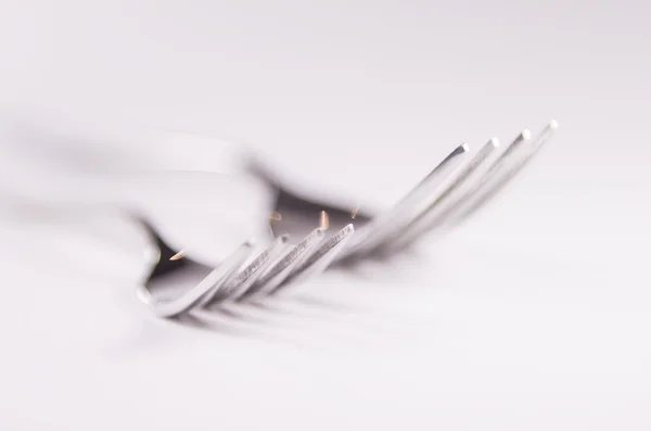 Cucchiaio forchetta in argento isolato su sfondo bianco — Foto Stock