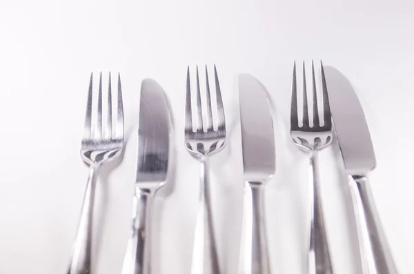 Cucchiaio forchetta in argento isolato su sfondo bianco — Foto Stock