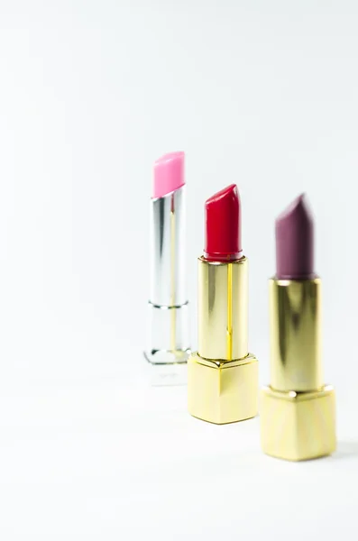 Glamour hermosos lápices labiales con oro — Foto de Stock