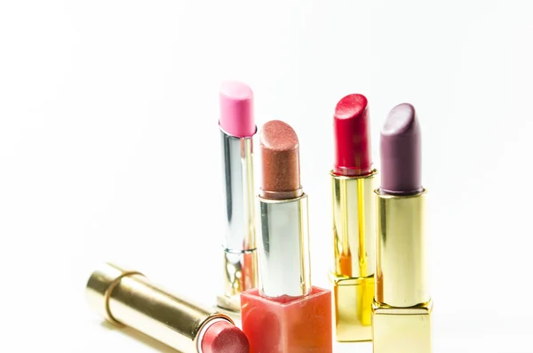 Glamour hermosos lápices labiales con oro — Foto de Stock