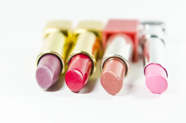 Glamour hermosos lápices labiales con oro —  Fotos de Stock