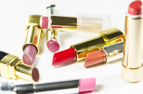 Glamour schöne Lippenstifte mit Gold — Stockfoto