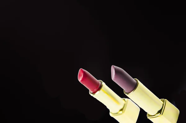 Glamour hermosos lápices labiales con oro — Foto de Stock