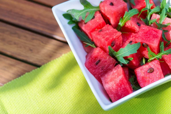 Delicious fresh watermelon and arugula salad — Stock Photo, Image