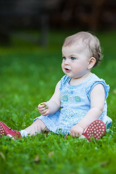 Beautiful gazing cute baby girl — Stock Photo, Image
