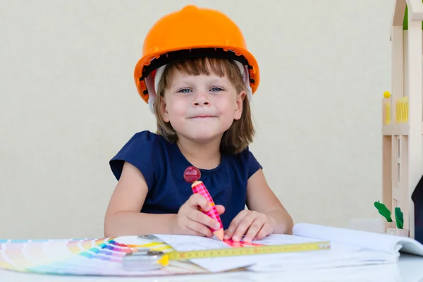 Smiling Little Girl In Orange Protective Helmet - Playing Engineer Or Builder — ストック写真