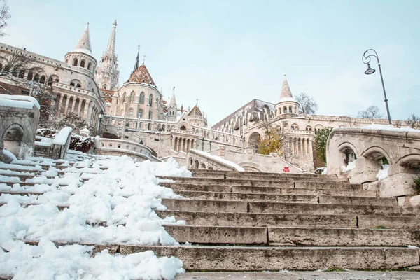 Fisherman\'s Bastion in early winter morning, snow-covered streets of Budapest