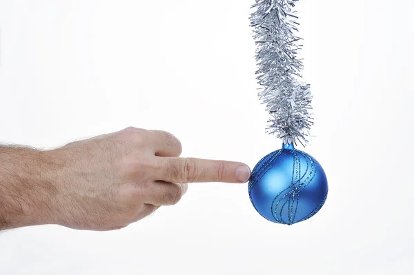 Blue Christmas ball with hand — Stock Photo, Image