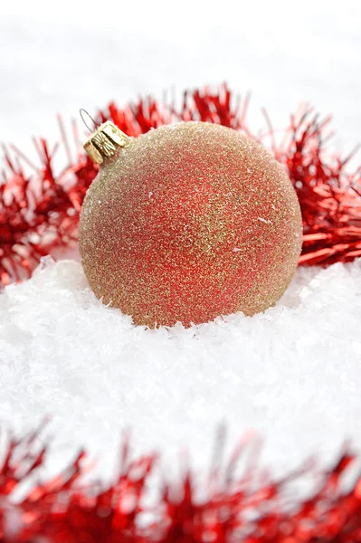 Red Christmas balls in the snow — Stock Photo, Image