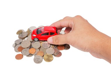 El arabasıyla sikke yığını üzerinde durmak