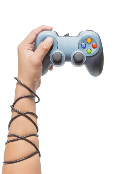 Hand holding game controller and tied up with cables — Stock Photo, Image