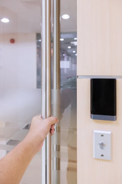 Hand Opening Door In Security System — Stock Photo, Image