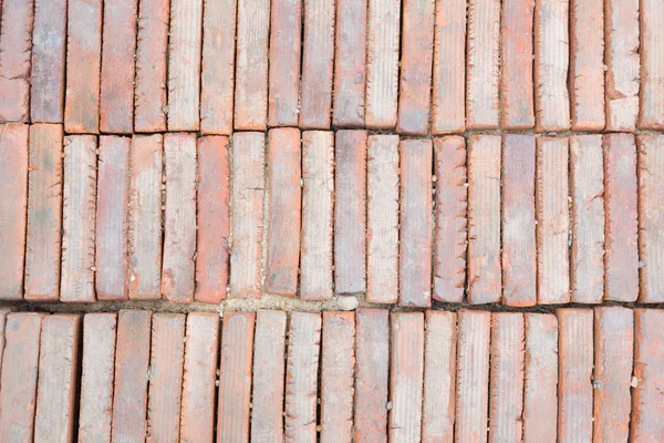 Red old bricks stacked in piles — Stock Photo, Image