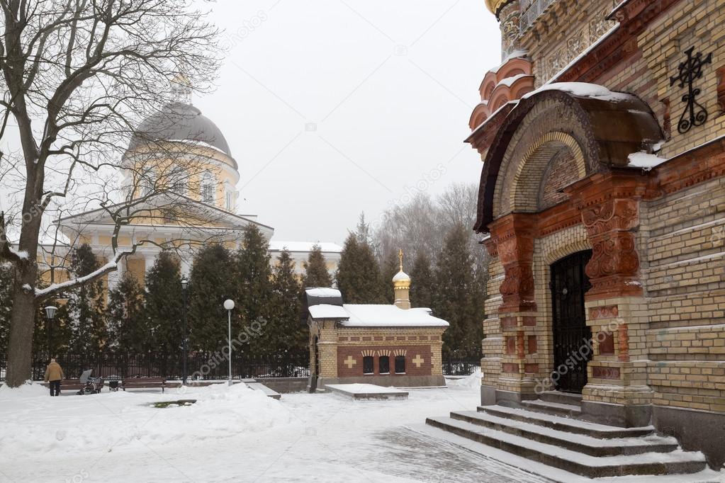 Bridge leading to the Peter and Paul Cathedral and chapel-tomb of Paskevich in city park in Gomel, Belarus. Winter