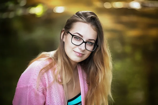 Close-up portrait of a girl in pink — Stock Photo, Image