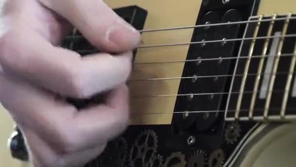 Six string electric guitar man playing notes — Stock Video