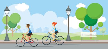 Couple Riding Bicycles In Public Park clipart