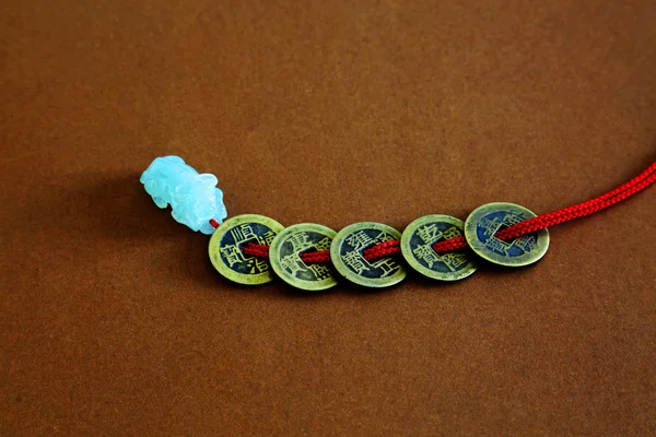 A Jade Buffalo and a Bunch of Chinese Ancient Coins — Stock Photo, Image