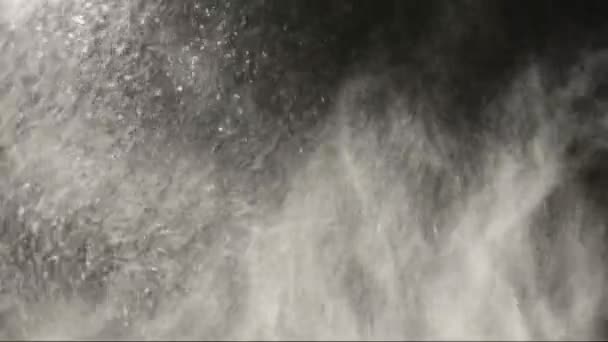 Snow Blizzard snow particles blowing ferociously on a black background. — Stock Video