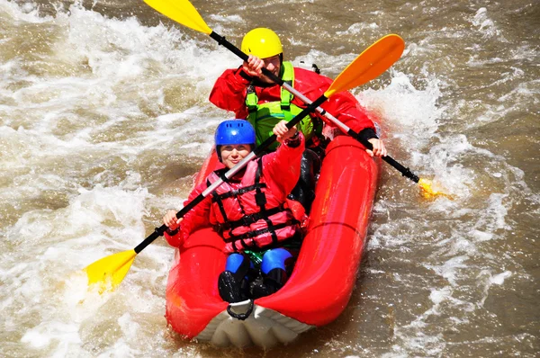 Vitt vatten team kajakpaddling — Stockfoto