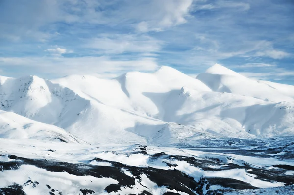 Landscape from Iceland, snow capped mountain peaks Stock Picture