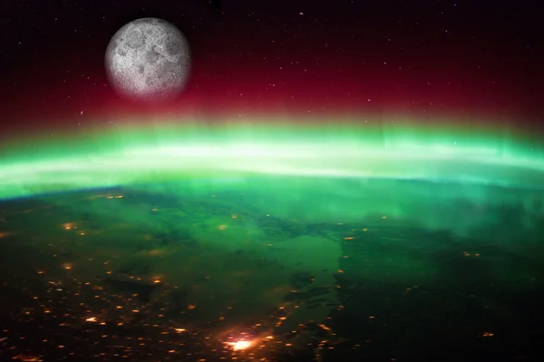 Aurora Borealis Australis från rymden Royaltyfria Stockbilder