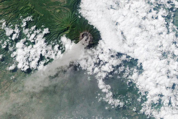 Erupting Volcano seen from space.  Some graphics are provided by NASA. — Stock fotografie