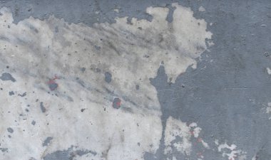 Aged gray painted concrete wall.