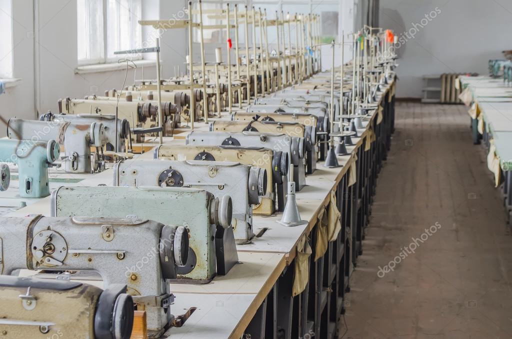 Garment factory with the old equipment — Stock Photo © NcikName 117132932