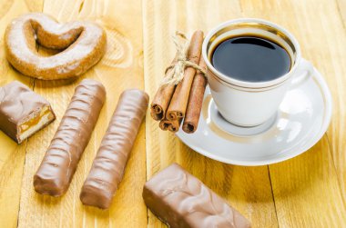 cup of coffee with candies clipart