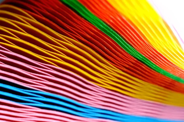 Papel colorido borrado sobre fundo . — Fotografia de Stock