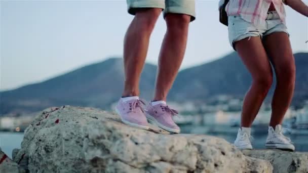 Couple jumping On Boulders — Stock Video