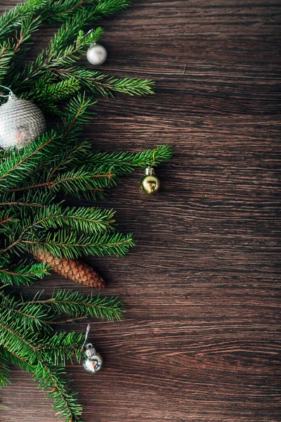 ( 영어 ) Christmas Tree Branches on a Brown Background with CopySpace for Text — 스톡 사진