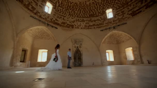 Brides in ancient temple hall in Greece — Stock Video
