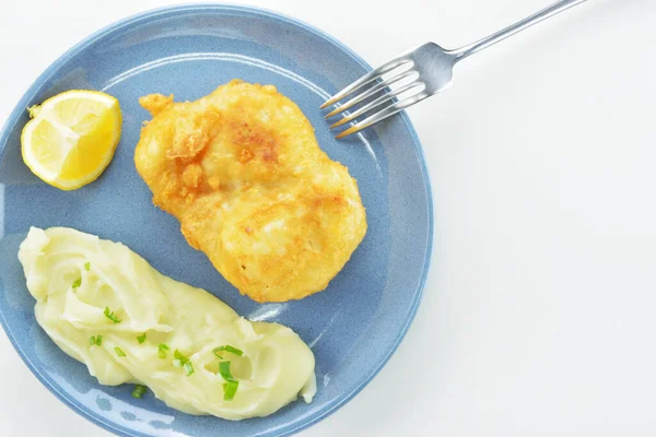 Traditional Greek dish of bread crumbed cod fish and garlic dip,known as skordalia on white background