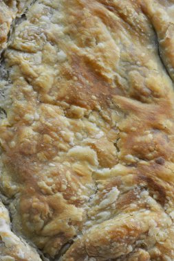 Yunan ıspanaklı peynirli turta yüzeyini kapatın