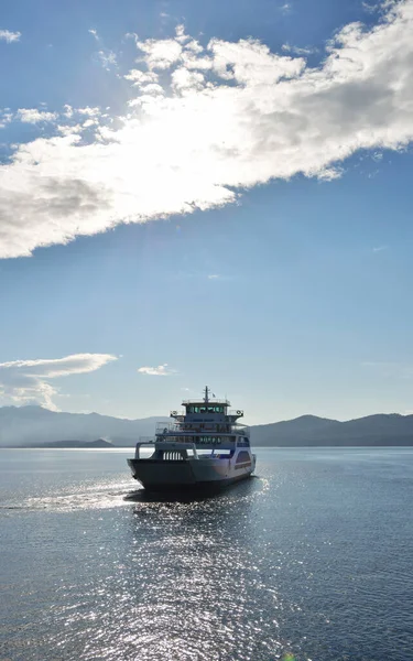 Traveling with ferry boat in calm sea water