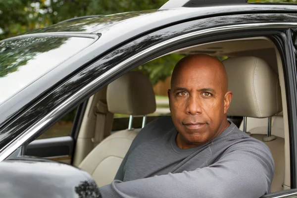 Man sitting in car — Stock Photo, Image