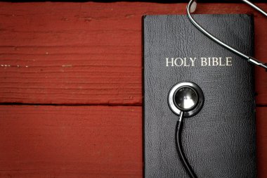 Bible book and medicine stethoscope clipart