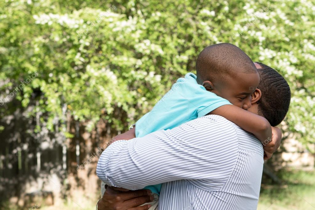 African American father and son — Stock Photo © pixelheadphoto 73212803