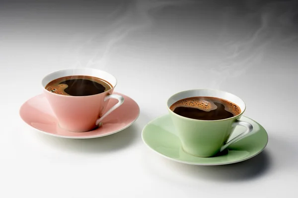 Dva šálky kávy na šedém pozadí — Stock fotografie