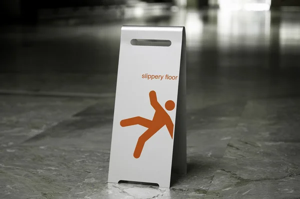 金属自立サイン滑りやすい床 ロイヤリティフリーのストック写真